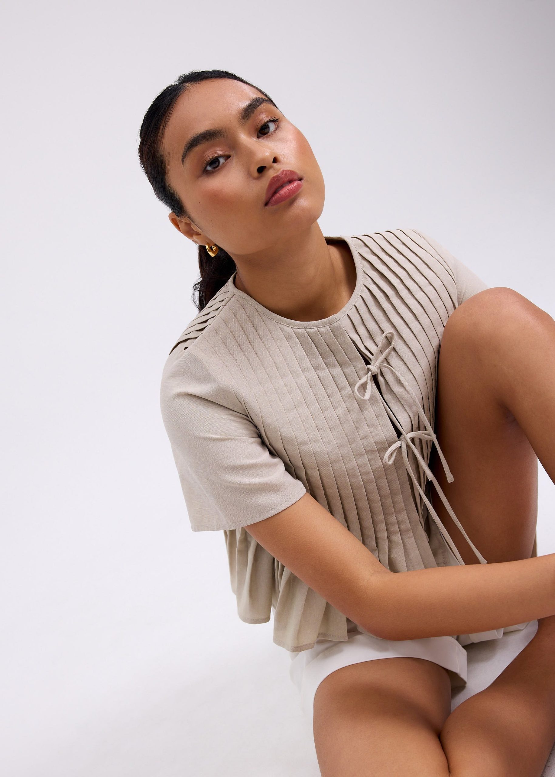Pintuck Notched Peplum Top - Image 2